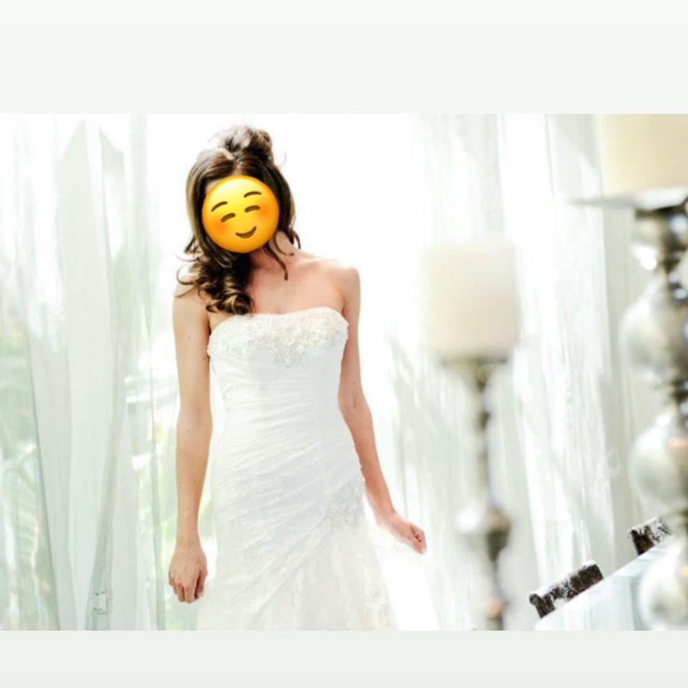 Strapless ivory lace wedding dress
